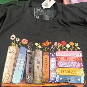 Taylor swift bundle - includes a shirt (size m) and 2 books
